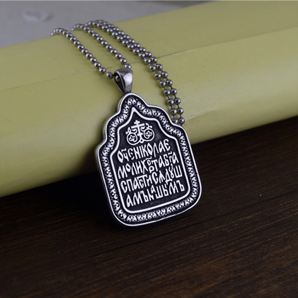 Collar de titanio con dije de Bendición Paternal