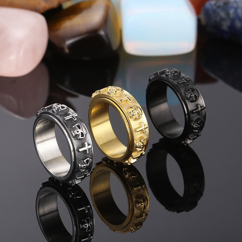 Anillo giratorio con calavera y cruz religiosa