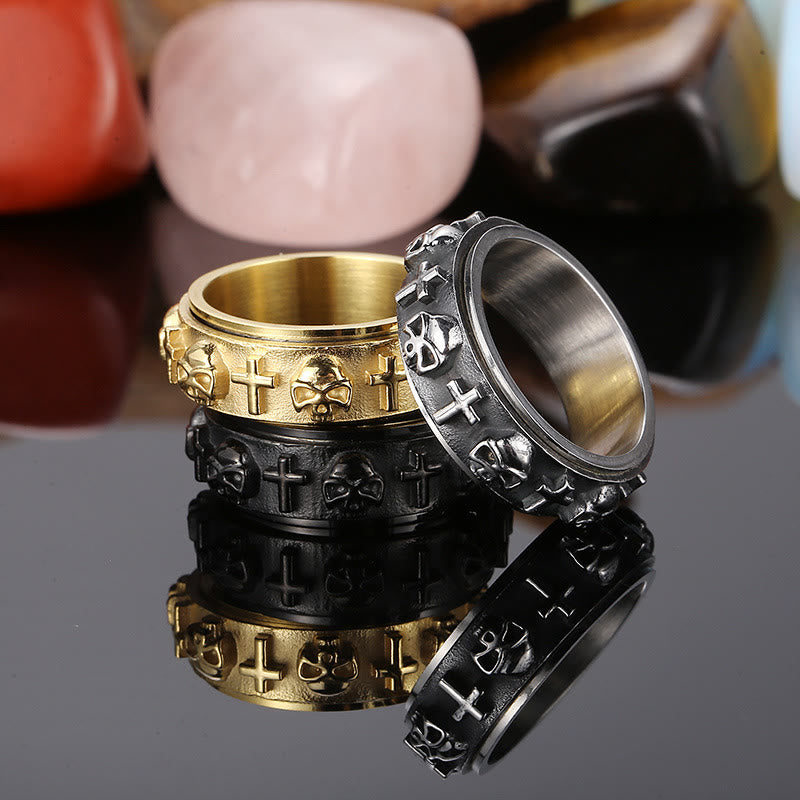 Anillo giratorio con calavera y cruz religiosa