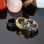 Anillo giratorio con calavera y cruz religiosa