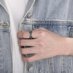 Anillo giratorio con calavera y cruz religiosa