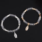 Pulsera de cuentas de vidrio transparente con colgante de la Virgen María
