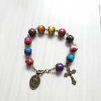 Pulsera de Madera Colores Antiguos con San Benito y Crucifijo