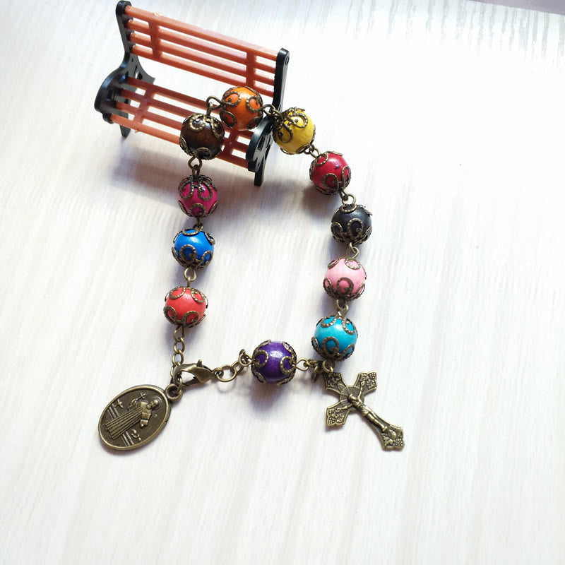 Pulsera de Madera Colores Antiguos con San Benito y Crucifijo