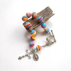 Bracelet en perles arc-en-ciel religieux Jésus et Marie