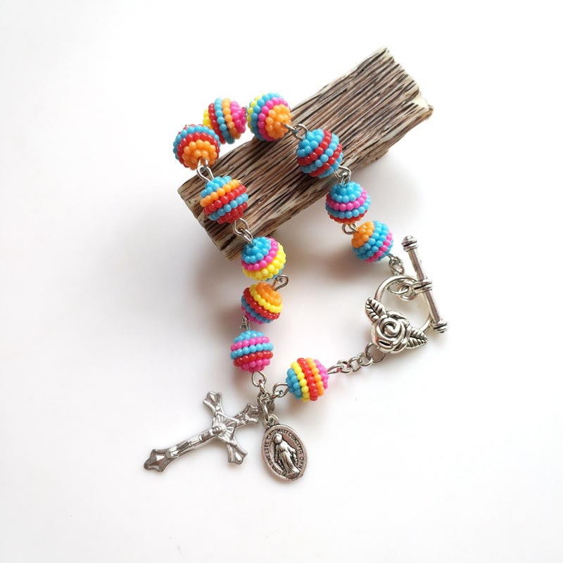 Bracelet en perles arc-en-ciel religieux Jésus et Marie