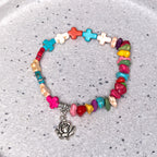 Pulsera turquesa de la Virgen María con rosas y cruz de estilo bohemio y colorido
