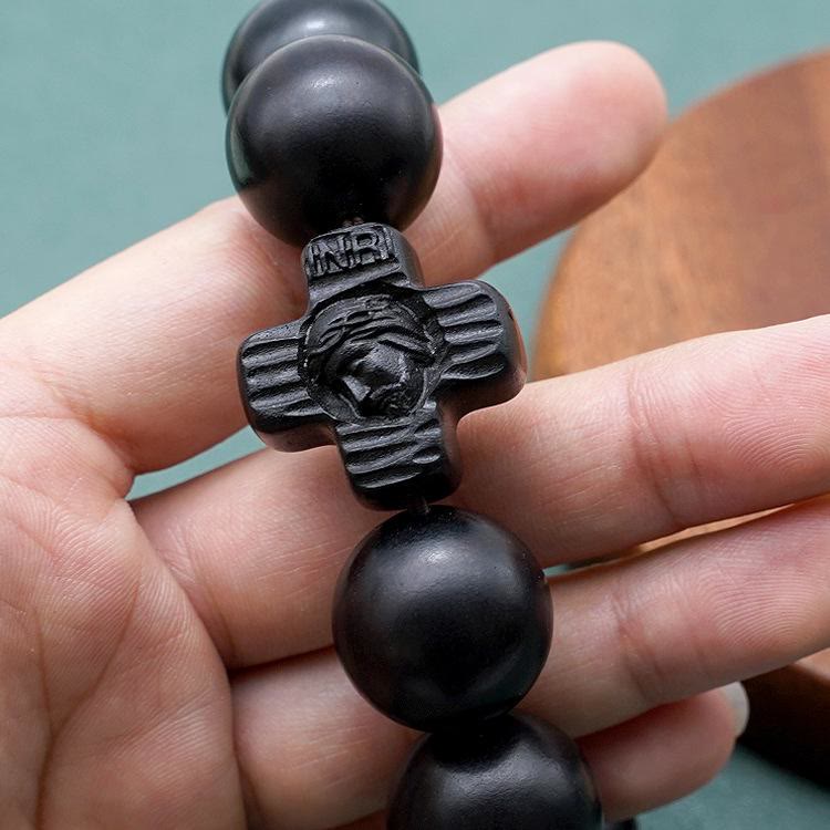 Pulsera de rosario de sándalo negro con cruz clásica de Jesucristo