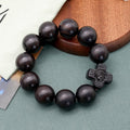 Pulsera de rosario de sándalo negro con cruz clásica de Jesucristo