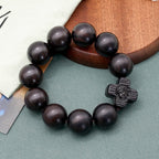 Pulsera de rosario de sándalo negro con cruz clásica de Jesucristo