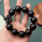 Pulsera de rosario de sándalo negro con cruz clásica de Jesucristo
