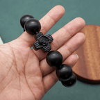 Pulsera de rosario de sándalo negro con cruz clásica de Jesucristo