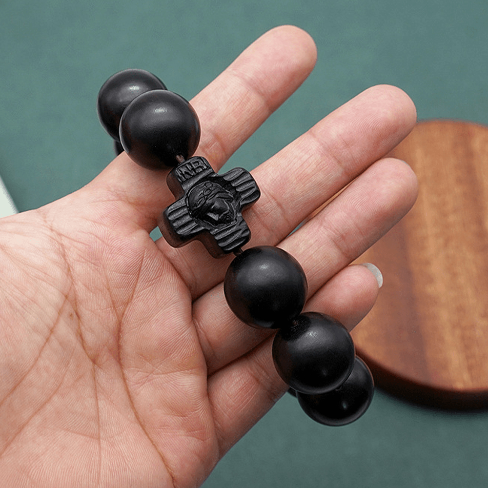 Pulsera de rosario de sándalo negro con cruz clásica de Jesucristo