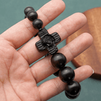 Pulsera de rosario de sándalo negro con cruz clásica de Jesucristo