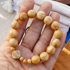 Chapelet portable élastique en bois d'olivier et perles roses
