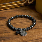 Jérusalem : Bracelet inspiré de la pierre noire brillante — Un symbole de foi