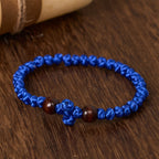 Blue & Black Cross - Knot String Bracelet: A Token of Faith