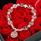 Bracelet Esprit Saint en émail avec croix et perles de roses : Symbole précieux de protection divine