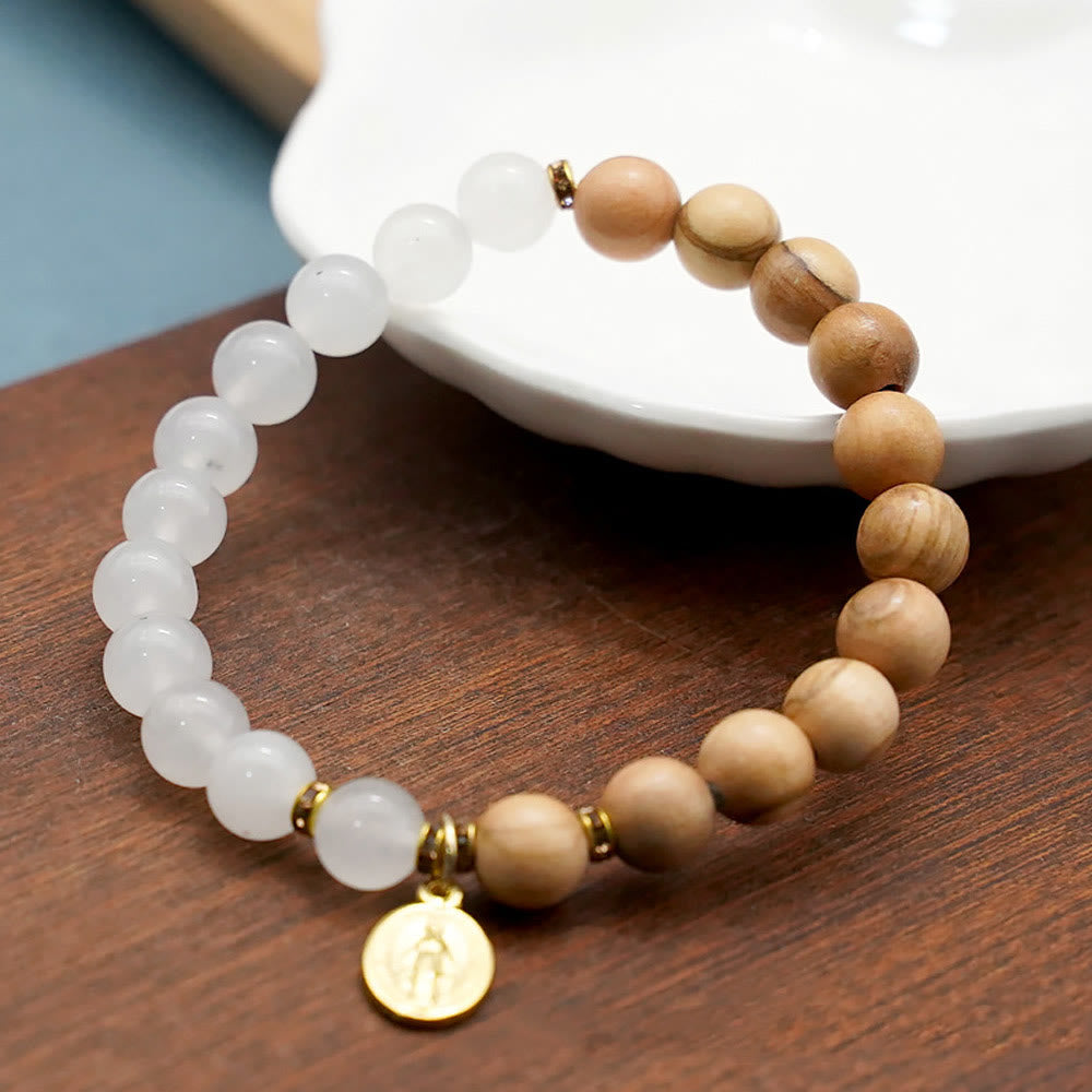 Bracelets perles agate rouge et calcédoine blanche avec pendentif Vierge Marie : un témoignage de dévotion