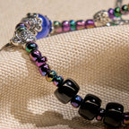Bracelet avec Notre-Dame et crucifix en ébène et agate bleue