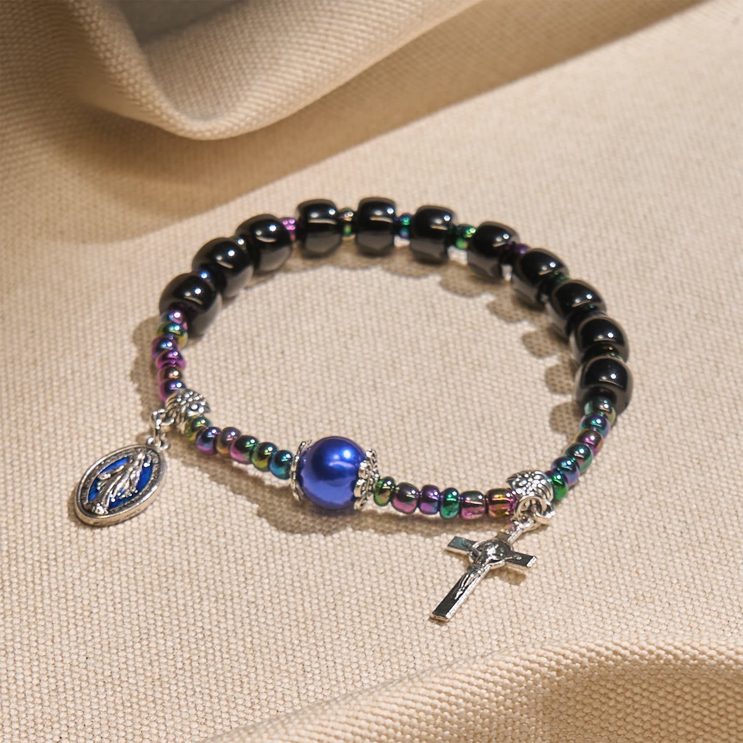 Bracelet avec Notre-Dame et crucifix en ébène et agate bleue