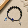 Bracelet avec Notre-Dame et crucifix en ébène et agate bleue