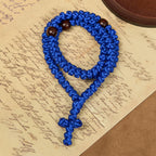 Collar de cuerda con cruz azul y negra de 100 nudos de bendición: símbolo preciado de la bendición sagrada