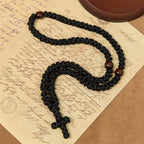 Collar de cuerda con cruz azul y negra de 100 nudos de bendición: símbolo preciado de la bendición sagrada