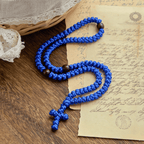 Collar de cuerda con cruz azul y negra de 100 nudos de bendición: símbolo preciado de la bendición sagrada