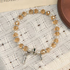 Pulsera elástica de cristal transparente moderno con crucifijo y medalla milagrosa: una declaración de fe contemporánea