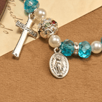 Pulsera elástica de cristal transparente moderno con crucifijo y medalla milagrosa: una declaración de fe contemporánea