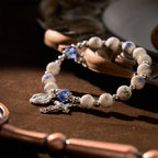 Bracelet élastique en céramique à fleurs multicolores avec médaille miraculeuse et crucifix : Élégance discrète de la foi