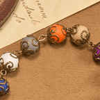 Pulsera de Cuentas Coloridas con Diseño Estilo Vintage y San Benito y Crucifijo de Bronce: Confianza en la Continuidad Divina