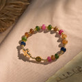 Pulsera de Cuentas de Turmalina con Cruz y Medalla Milagrosa