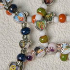 Pulseras de Cuentas de Vidrio y Cerámica de Colores con Dijes de Corazones de Cruz y Santos