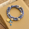 Pulsera de Rosario Artesanal Elástica de 4mm con Piedras Azules, Crucifijo y Cruz de Jerusalén