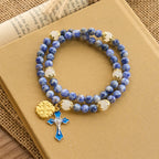 Pulsera de Rosario Artesanal Elástica de 4mm con Piedras Azules, Crucifijo y Cruz de Jerusalén