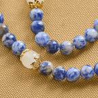 Pulsera de Rosario Artesanal Elástica de 4mm con Piedras Azules, Crucifijo y Cruz de Jerusalén