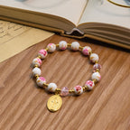 Bracelet élégant en céramique rose à motif floral de 8 mm avec médaille miraculeuse