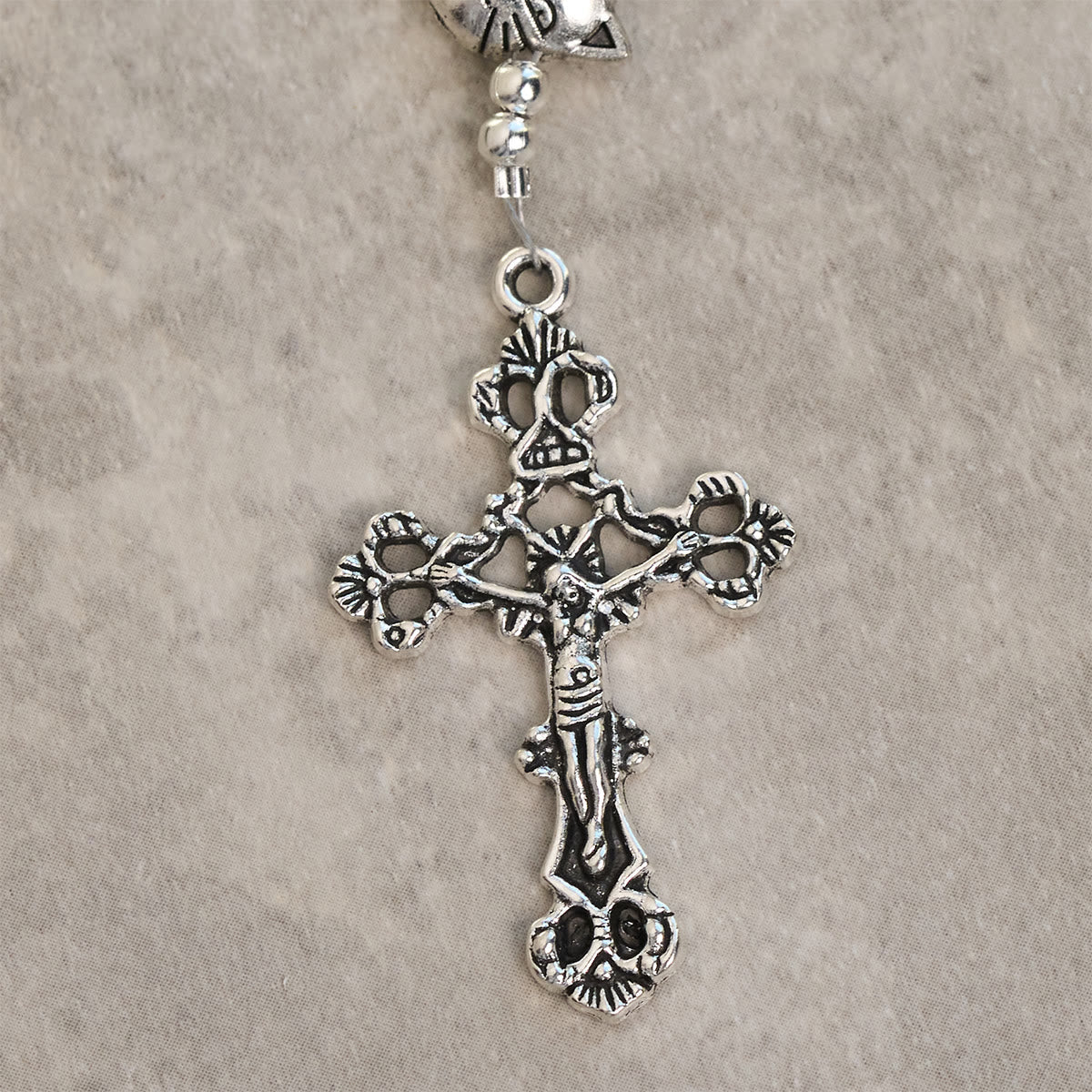 Bracelet chapelet animal Notre-Dame en perles avec chat-vache noir et blanc