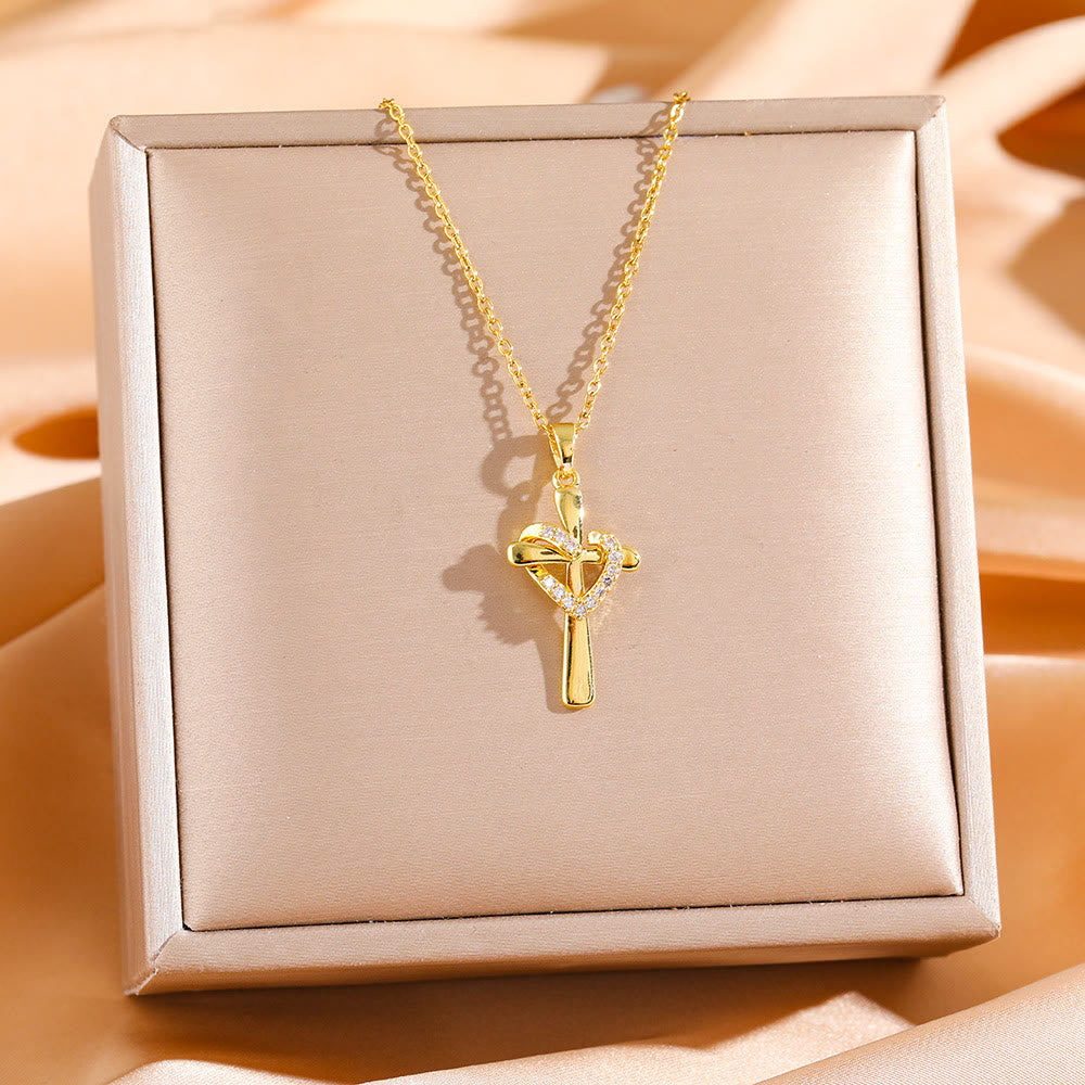 Collar Corazón y Cruz Bicolor con Circonitas: Fusión de Amor y Fe