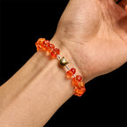 Rosario, pulsera con cuentas en forma de calabaza