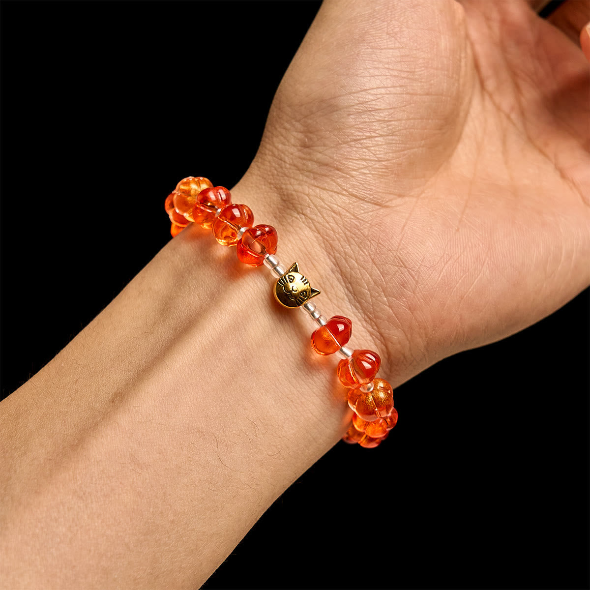 Rosario, pulsera con cuentas en forma de calabaza