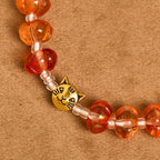 Rosario, pulsera con cuentas en forma de calabaza
