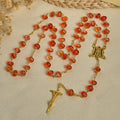 Rosario, pulsera con cuentas en forma de calabaza