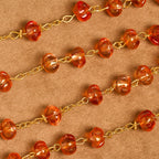 Rosario, pulsera con cuentas en forma de calabaza