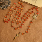 Rosario, pulsera con cuentas en forma de calabaza