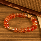 Rosario, pulsera con cuentas en forma de calabaza