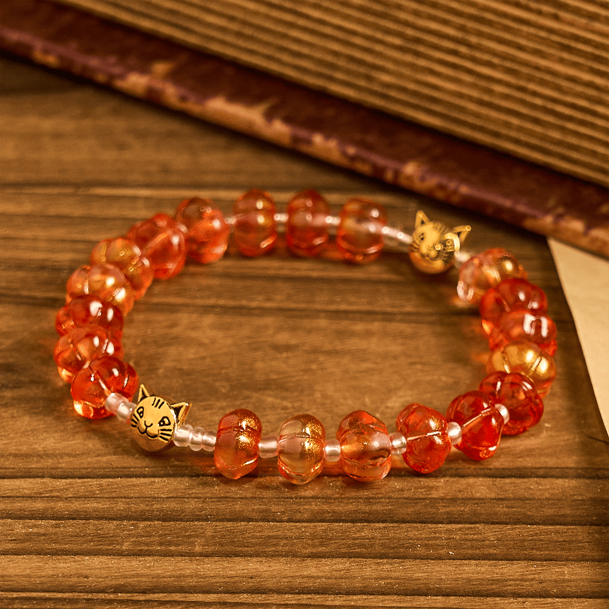 Rosario, pulsera con cuentas en forma de calabaza
