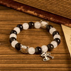 Bracelet chapelet animal Notre-Dame en perles avec chat-vache noir et blanc